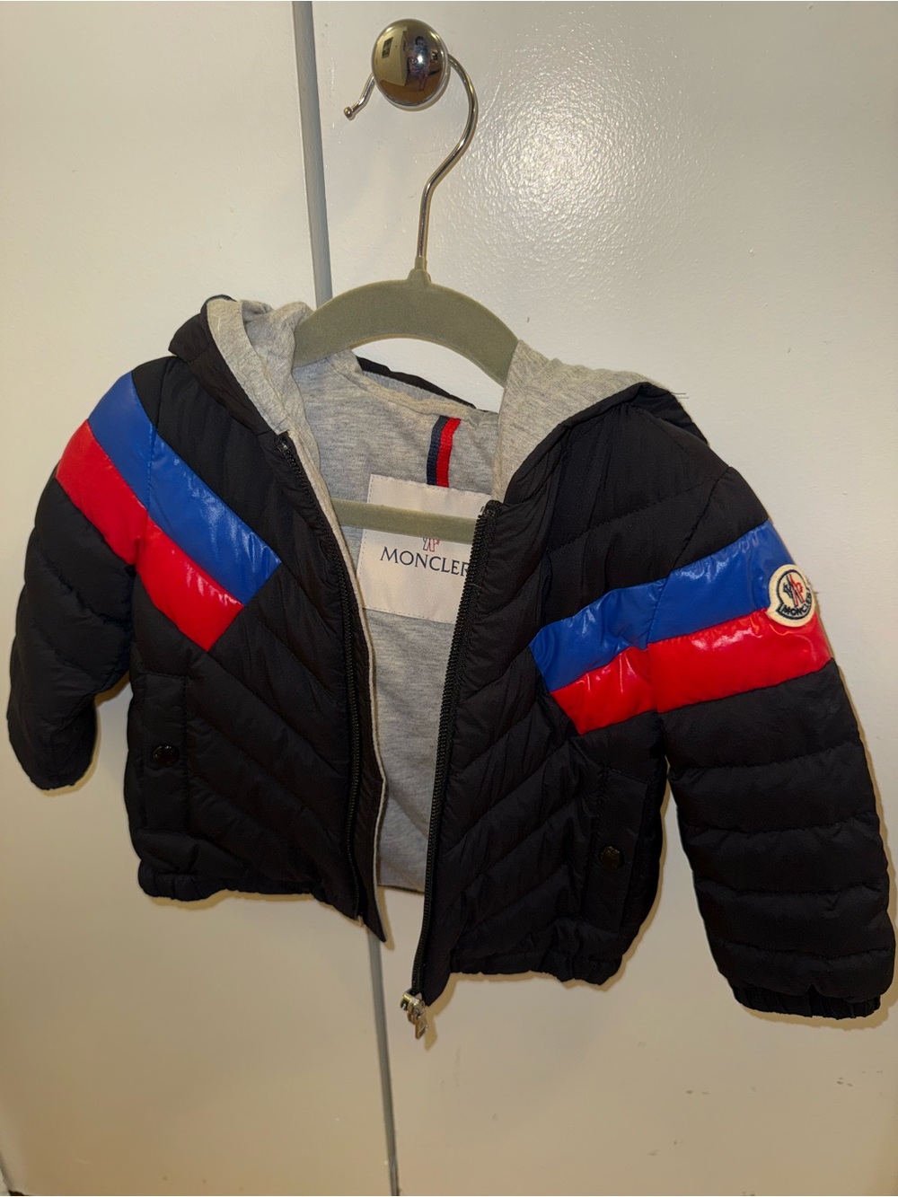 Moncler Kids Black Puffer Jacket with Red and Blue Stripes